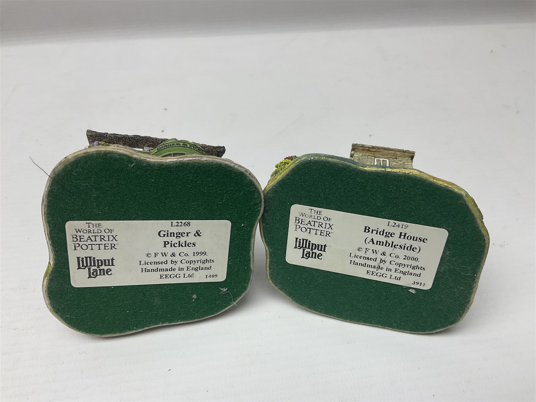 Eight Lilliput Lane limited edition Beatrix Potter models, including Buckle Yeat, Tabitha Twitchits Shop and Ginger Pickles Shop, together with twelve Lilliput Lane models from the Blaise Hamlet collection, including Dial Cottage, Diamond Cottage and Vine Cottage, all with deeds and original boxes (20)