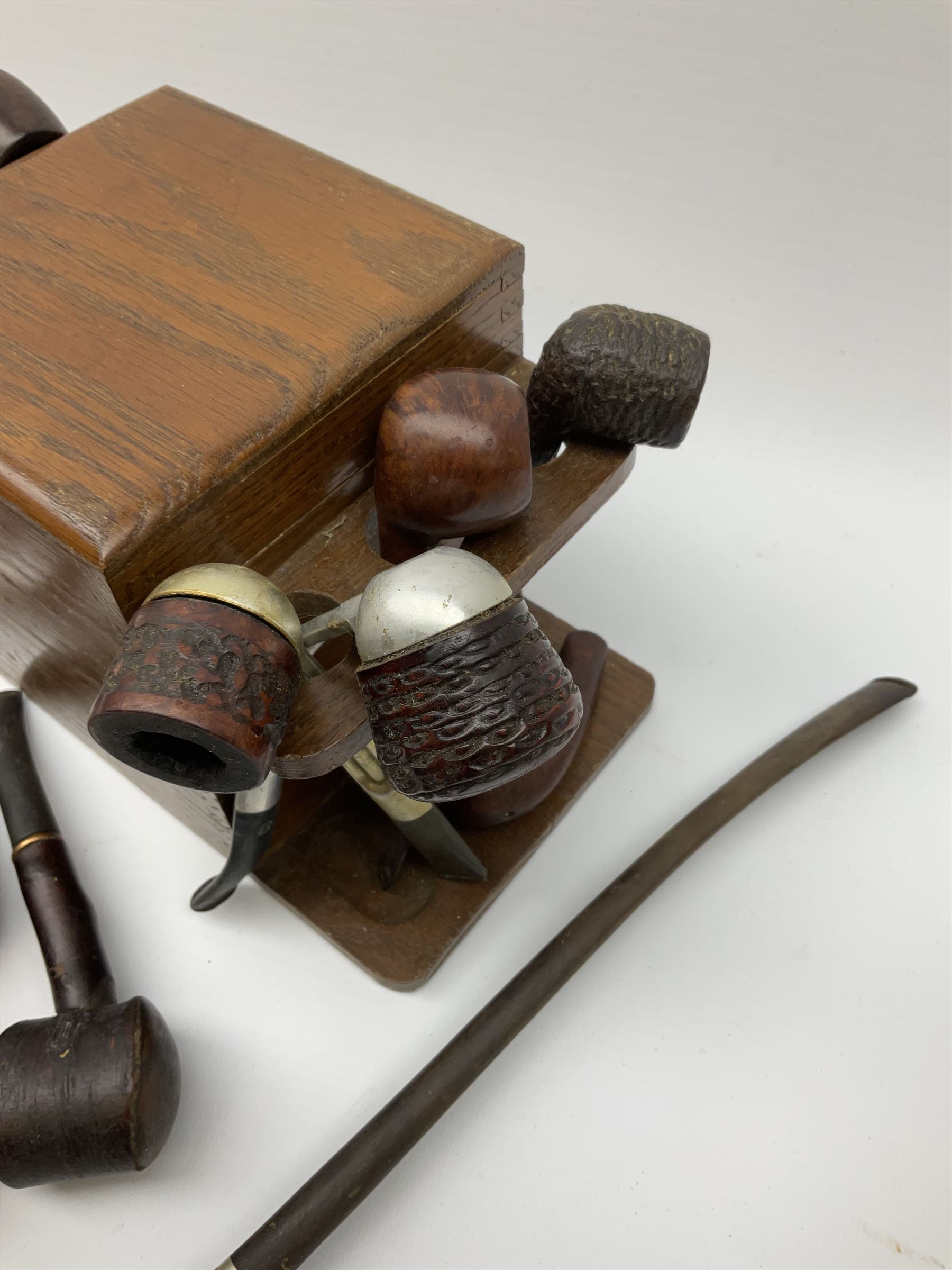 Vintage pipes and smoking related items including 'Falcon' and 'Dr Grabow' pipes, small wooden pipe rack/box and other related items