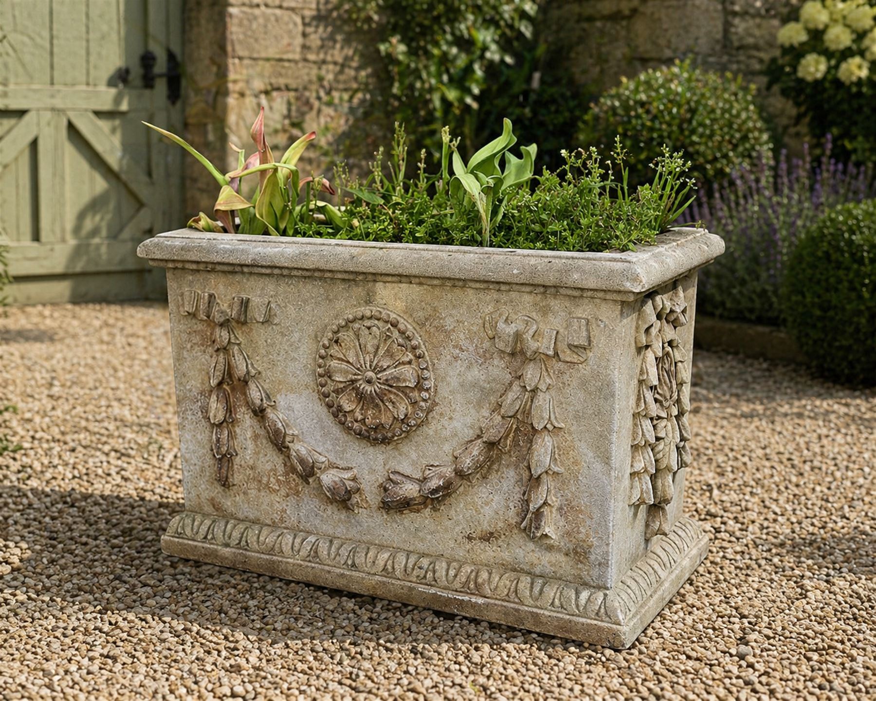 Haddon stone - cast rectangular planter, swag and motif detail, planted