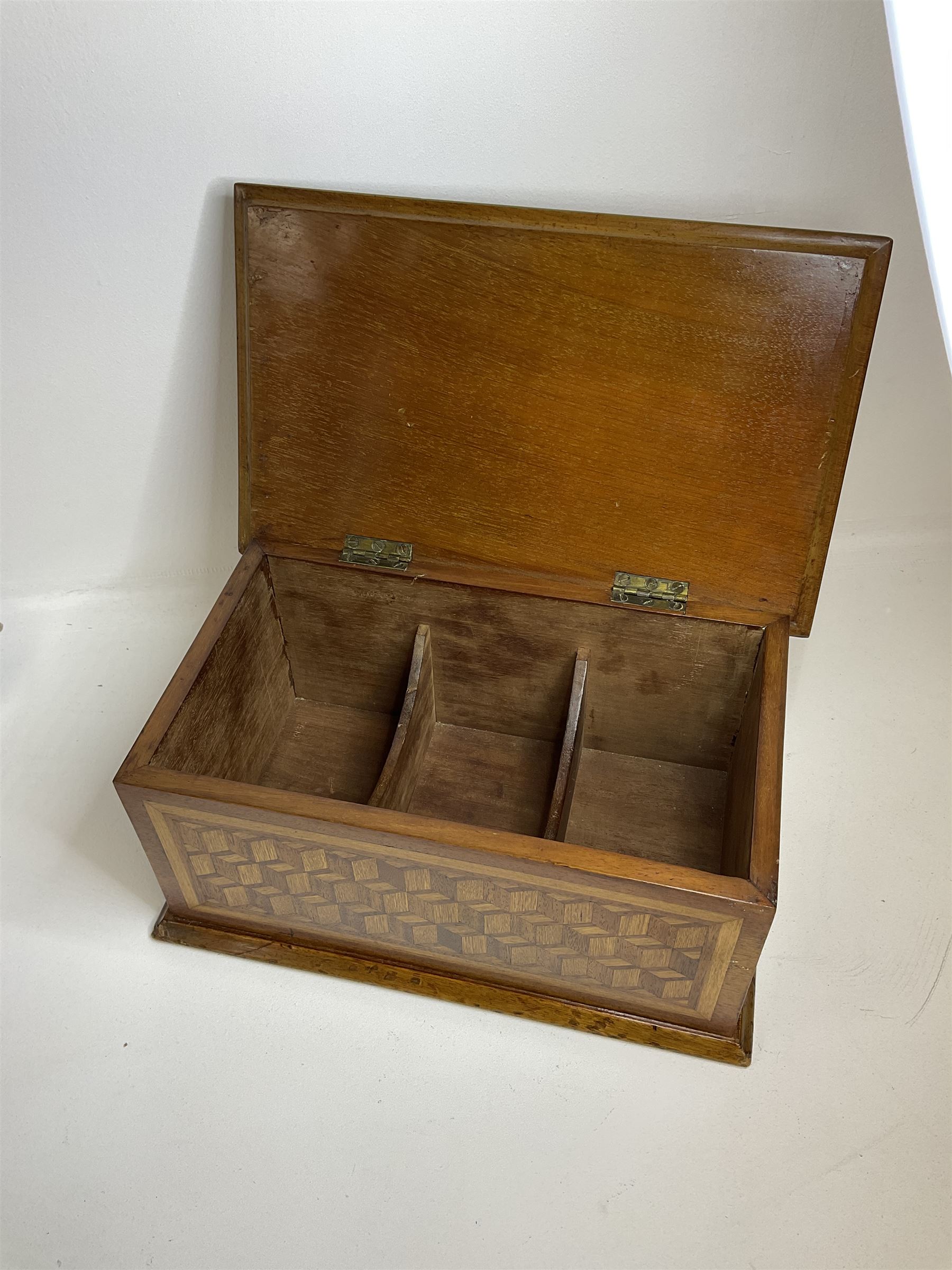 19th Century mahogany and parquetry box of rectangular form, geometric cube design, with a stylised sun detail to the hinged cover, opening to reveal three compartments, L33cm D21cm H16cm
