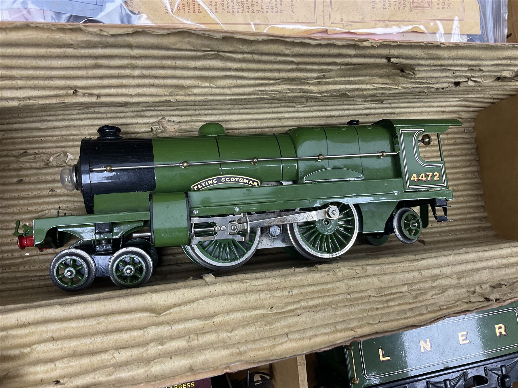Hornby '0' gauge - three-rail electric train set with LNER Riviera Blue 4-4-2 locomotive 'Flying Scotsman' No.4472 and No.3 tender, No.2 Special Pullman Coach 'Loraine', No.2 Special Pullman Composite Coach 'Verona', goods wagon with Furniture Removals container, boxed Circuit Breaker, two boxes of Connecting Plates, boxed Terminal Connecting Plate and quantity of track; boxed with paperwork; together with Breakdown Van and Crane and Transformer No.T20A; both boxed