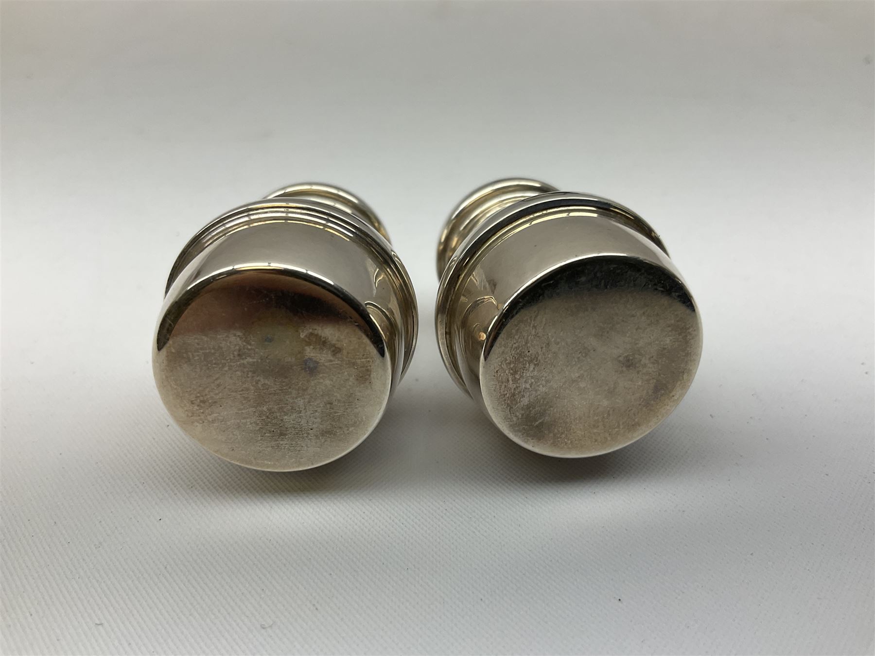 Pair of miniature hallmarked silver cruets, in fitted box, together with a pair of hallmarked silver sugar tongs, approximate total silver weight 38 grams