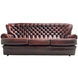 Wade - Georgian design three-seat sofa, high curved back over scrolled arms, upholstered in deep buttoned oxblood 'Pegasus' leather, on castors