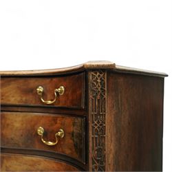 George III Chippendale period mahogany serpentine-fronted chest, shaped top with moulded edge over a deep serpentine outline with four graduated drawers, the canted corners decorated with blind-fretwork geometric decoration, fitted with brass swan-neck handles, lower moulded edge on bracket feet, circa 1760-1770