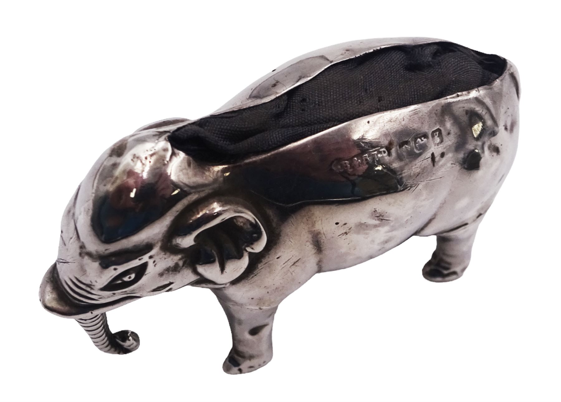 Edwardian silver novelty pin cushion, modelled as an elephant with cushioned back, hallmarked Birmingham 1906, maker's mark indistinct, H3.2cm, approximate total weight 0.46 ozt (14.1 grams)