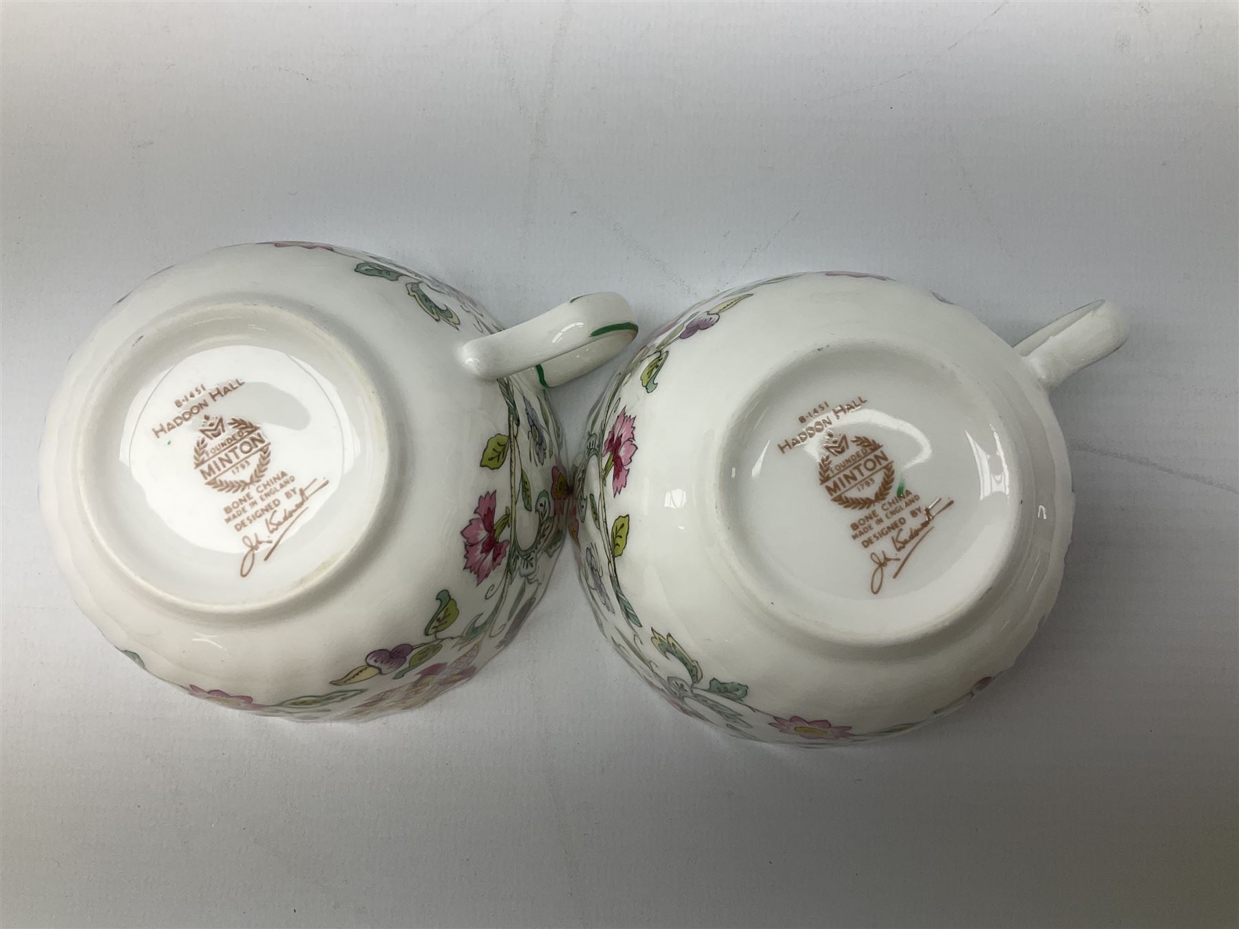 Minton Haddon Hall pattern tea set, comparing teapot, two tea cups and saucers (5)
