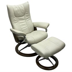Stressless by Ekornes - 'Signature Wing' reclining armchair with matching footstool, upholstered in stitched cream leather 