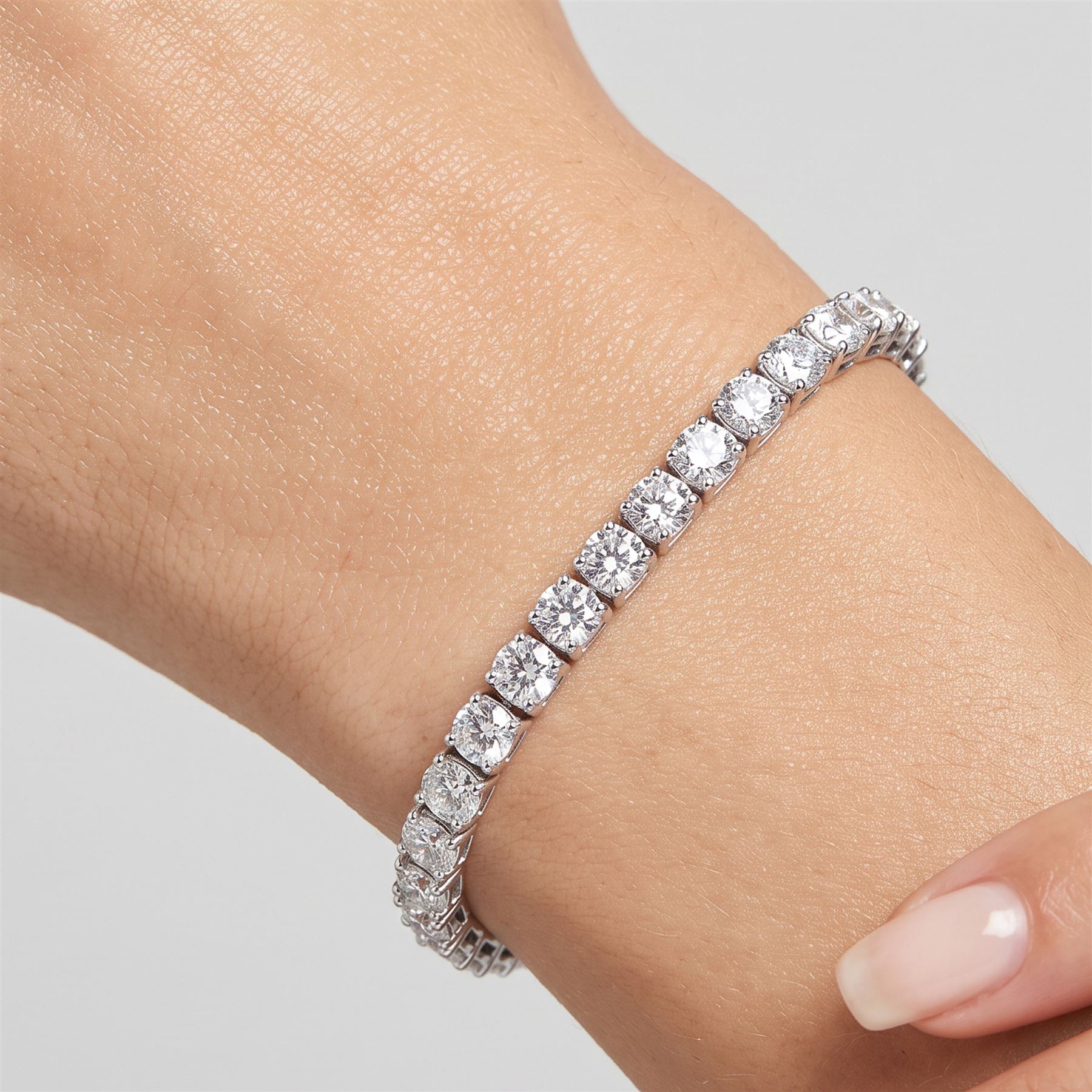 18ct white gold diamond bracelet, set with thirty-eight round brilliant cut diamonds, stamped 750, total diamond weight approx 11.45 carat