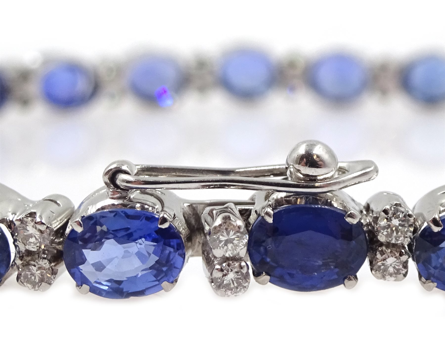 18ct white gold oval sapphire and diamond bracelet, stamped 750, total sapphire weight approx 12.00 carat