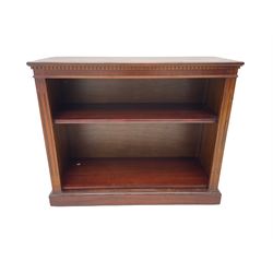 Georgian design mahogany open bookcase, dentil cornice over two adjustable shelves, flanked by fluted uprights