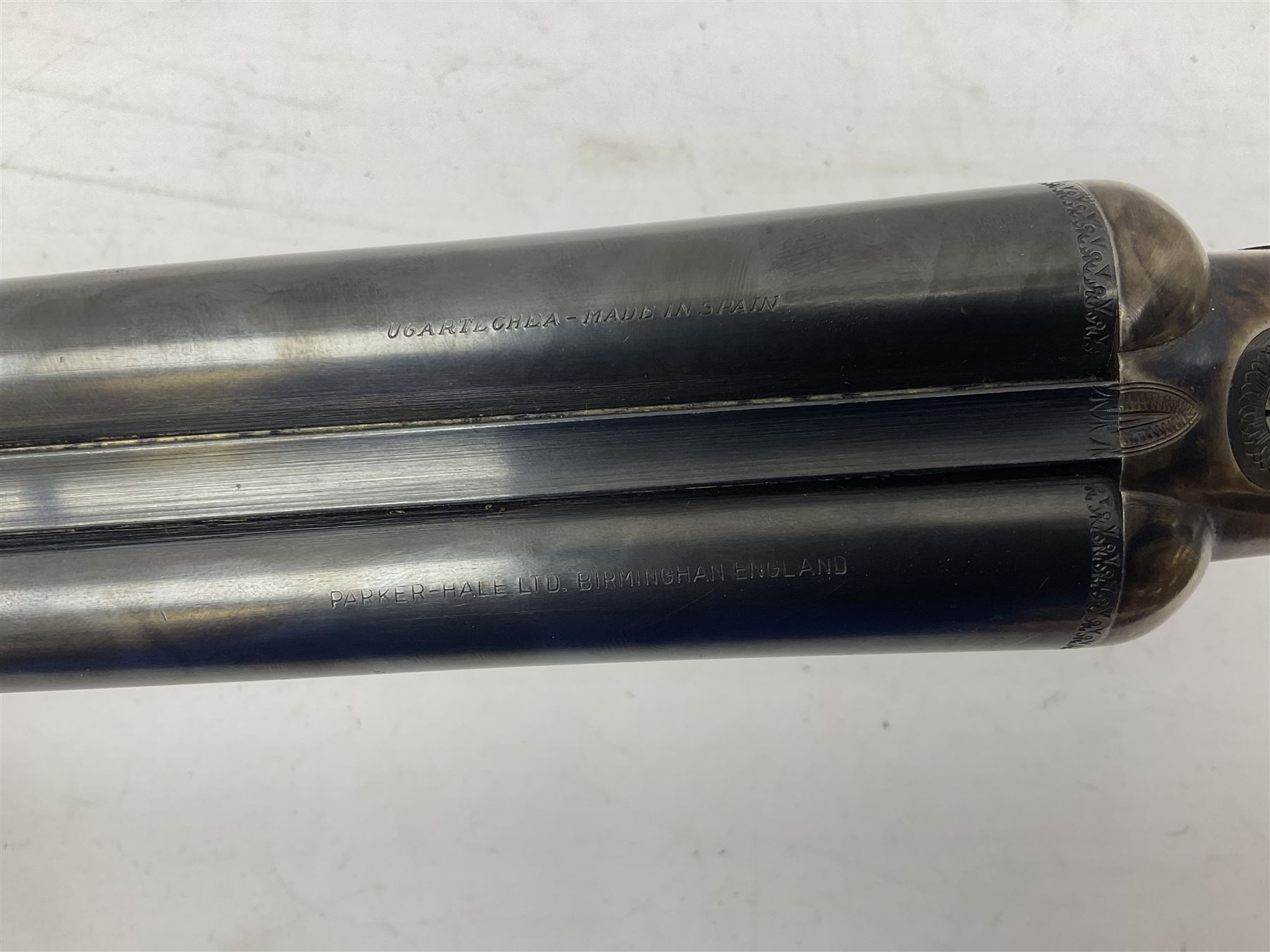 Spanish Ugartechea 20-bore double barrel side-by-side boxlock non-ejector sporting gun, retailed by Parker Hale Birmingham, with 67.5cm barrels, walnut stock with chequered grip and fore-end No.171199 L112cm overall SHOTGUN LICENCE REQUIRED