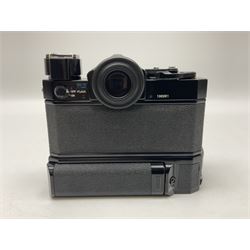 Canon F1 camera body, serial no. 136281, with 'Canon FD 50mm 1:1.8 S.C' lens, serial no.1702944 and Canon F Power winder, serial no.120072