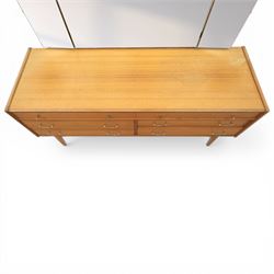 Golden Key By Palatial Ltd - mid-20th century teak dresser, three part mirror above a rectangular top, with six drawers with brass handles and pulls, upon splayed tapering legs 