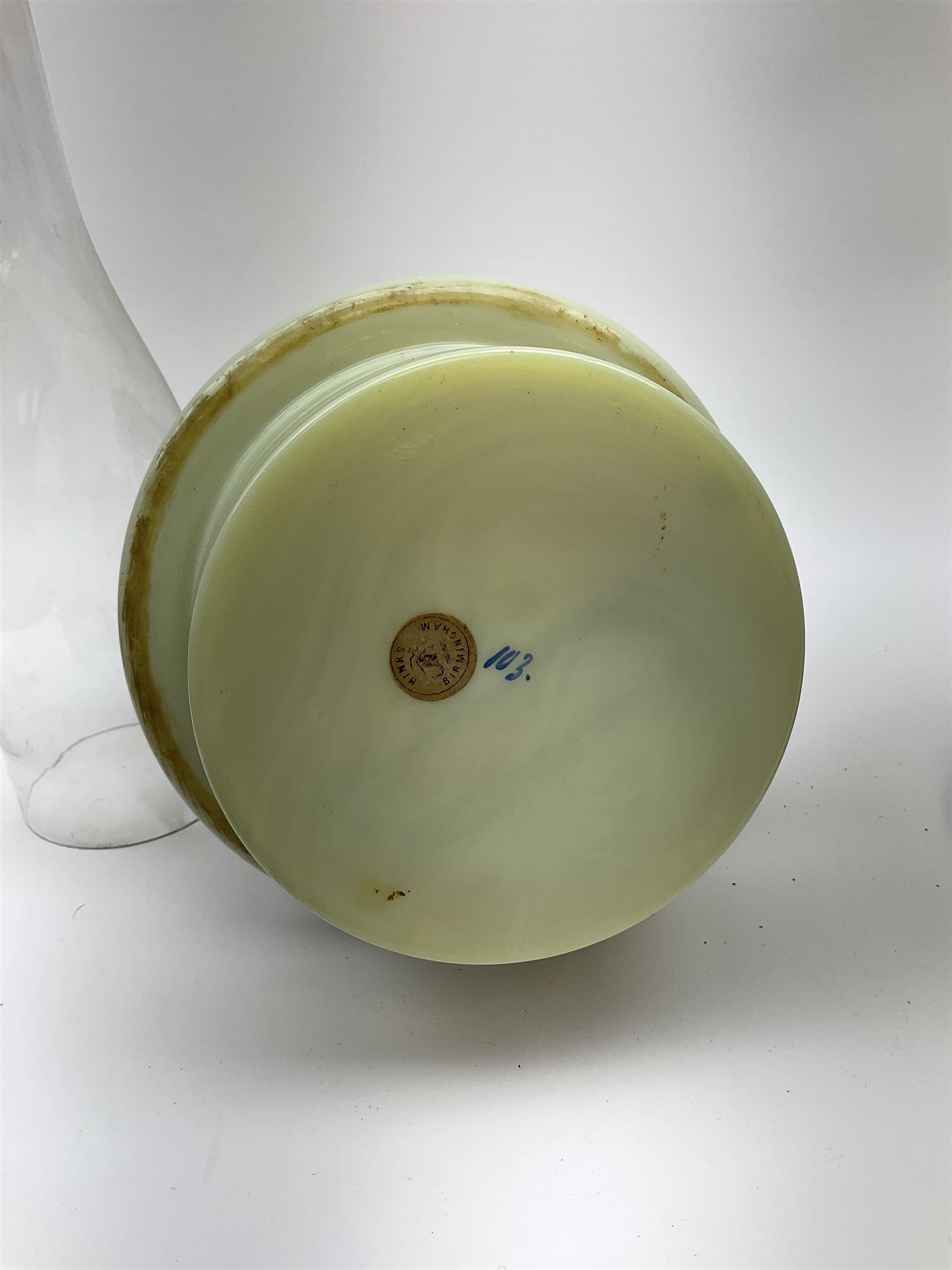 A Victorian oil lamp, with opaque glass reservoir hand painted with flowers beneath a Hinks burner and supporting a globular floral painted opaque glass shade and glass chimney, H47.5cm. 