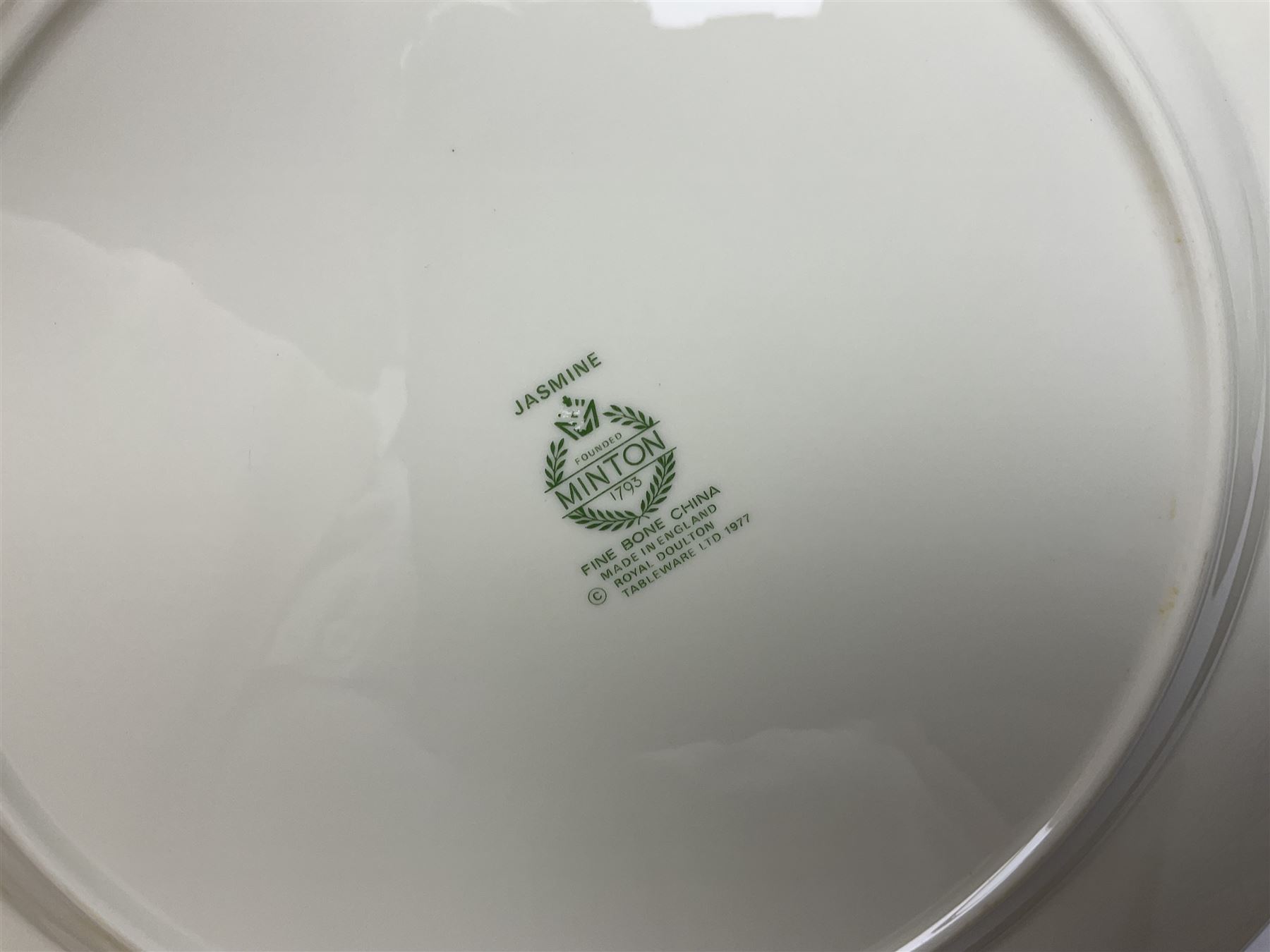 Minton Jasmine pattern tea and dinner wares, including dinner plates, sauce boats, side plates, bowls, teacups, coffee cans and twin handled soup bowls, etc (122)