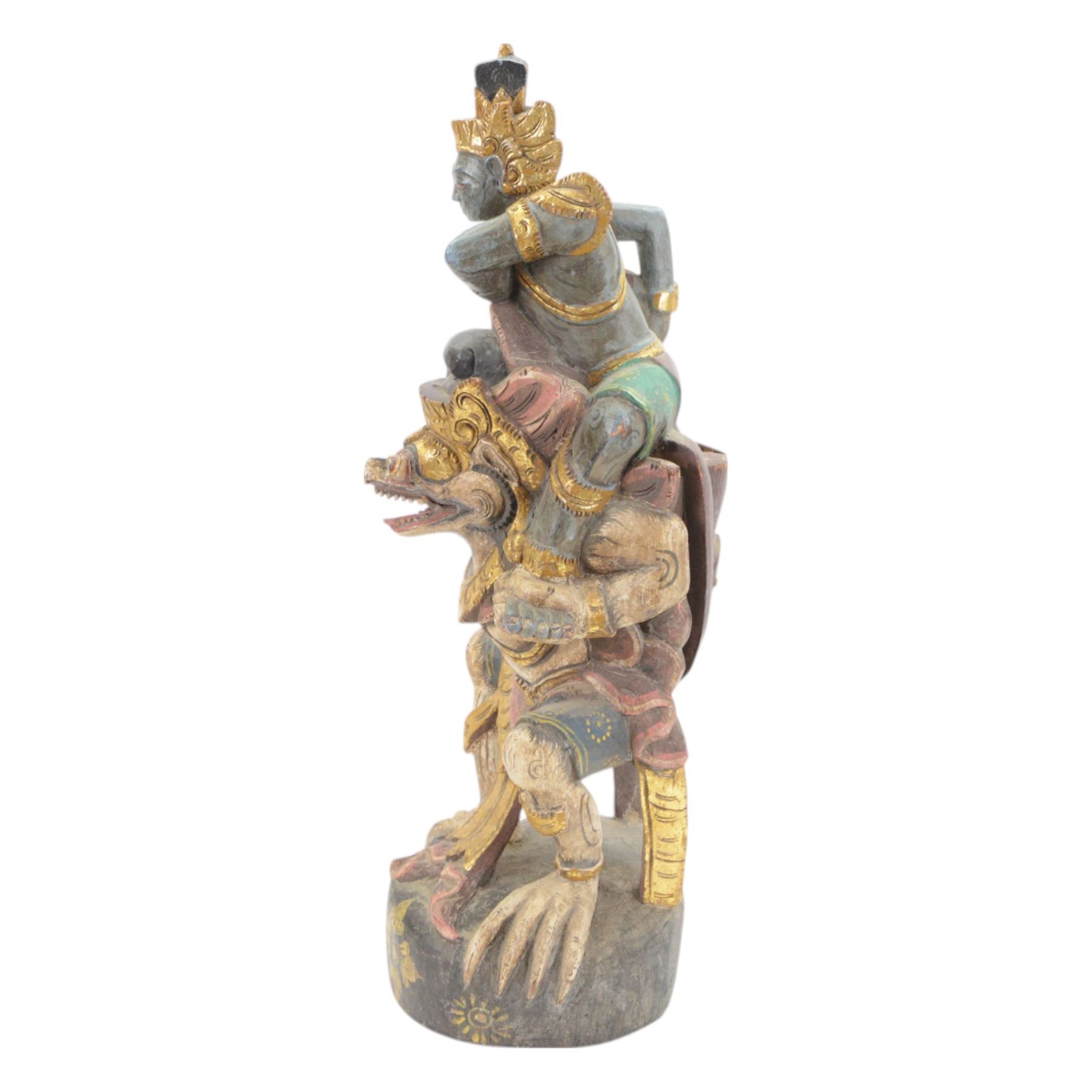 Hindu wooded sculpture depicting Vishnu riding on the shoulders of Garuda, H80cm