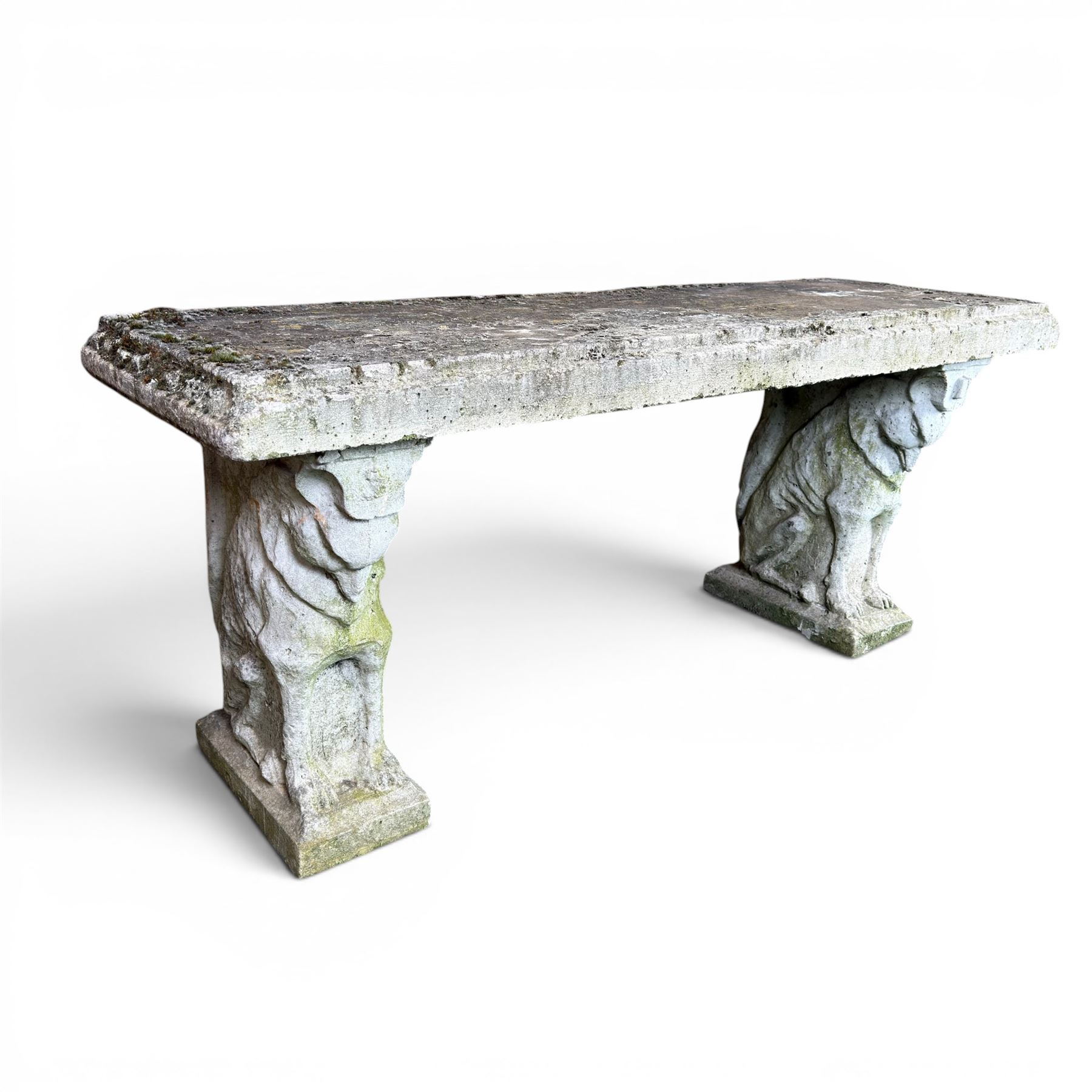 Weathered cast stone three piece garden bench, slab top raised on mythical creature supports