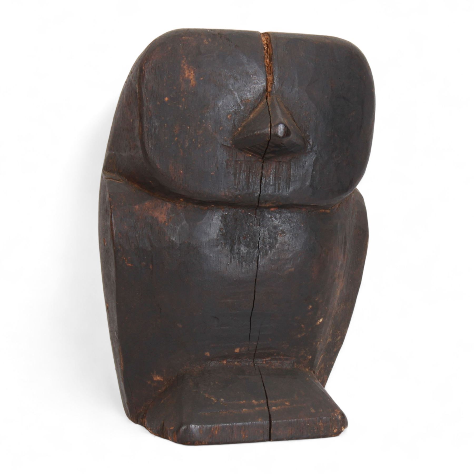Late 19th/early 20th century Burmese carved wooden figure, primitively carved as an owl, H26.5cm W18cm

Cf. Comparable Lot sold at auction:
Lot 22, Works from the Collection of Peter Petrou, Sotheby's, 21st September 2021