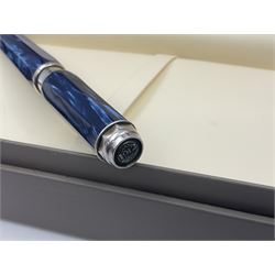 Montegrappa Emblema fountain pen, the blue pearl marbled barrel of octagonal form with silver mounts stamped 925 and silver mounted cap with 1912 emblem and clip with roller, in box, L13.5cm
