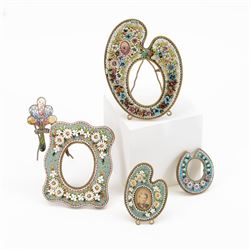 Micro mosaic picture frame in the form of an artists pallet, surrounded by colourful flowers against a cream ground, together with three other micro mosaic frames, each decorated with flowers upon a blue ground, largest 9cm 