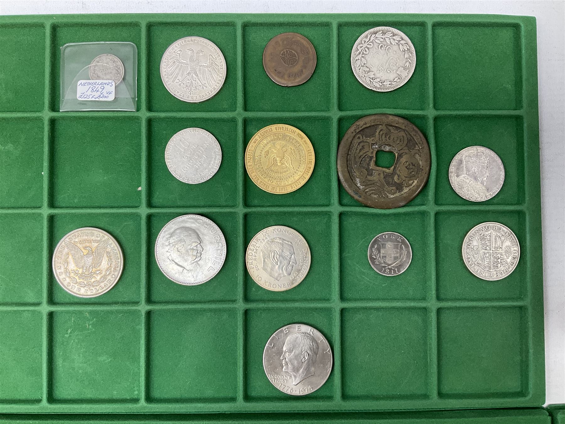 Coins and medallions including, York 1811 one shilling cattle and barber silver token, United States of America 1883O silver Morgan dollar, birds of destiny medal by Malcolm Appleby, Great British King George V 1930 halfcrown, King Edward VII 1902 silver medal, King George V 1916 halfcrown etc, housed in a case with lift out green coin trays