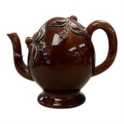 Brameld Cadogan Pottery Teapot, decorated in a brown glaze and applied with trailing fruit and flowers, impressed mark beneath 