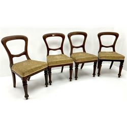 Set of four balloon back mahogany dining chairs, upholstered in pale gold floral fabric, rear shaped and front turned supports 