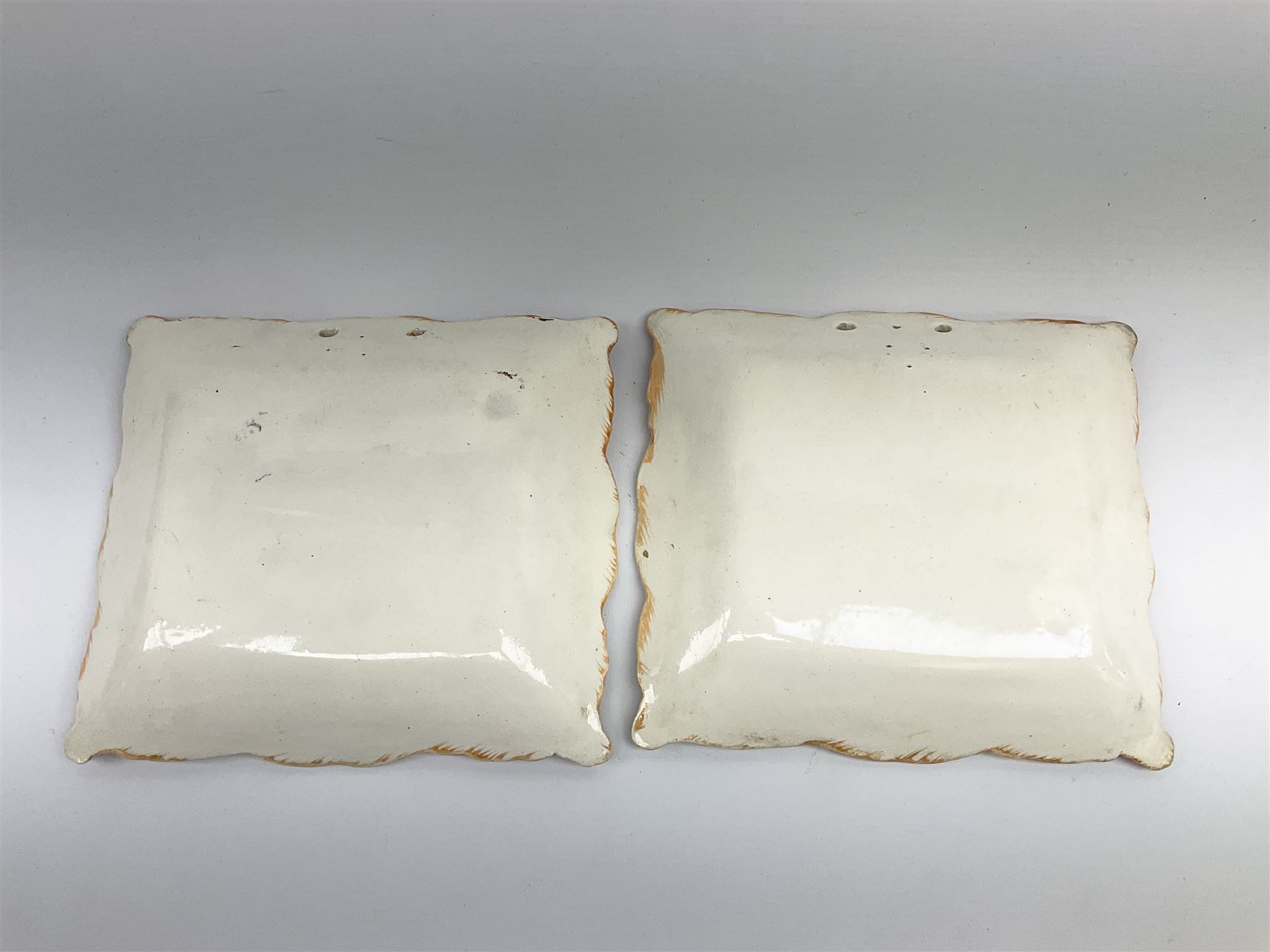 Two 19th century Sunderland orange lustre wall plaques, the first example inscribed Thou God Seest Me, the second example inscribed Prepare To Meet Thy God, H20cm L23cm.