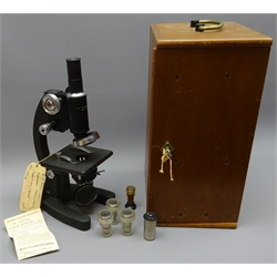  Cooke, Troughton & Simms Ltd. black crackle enamel Microscope, 1.5X Div-002MM, No.10596, with chrome fittings, rack & pinion coarse & fine focus and three objective turret, on horseshoe base with additional optical, in fitted case, H36cm  
