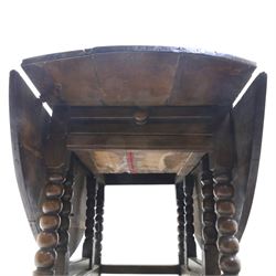 18th century country oak oval dining table, plank top with two drop leaves and gate-leg action, single drawer, raised on bobbin turned legs