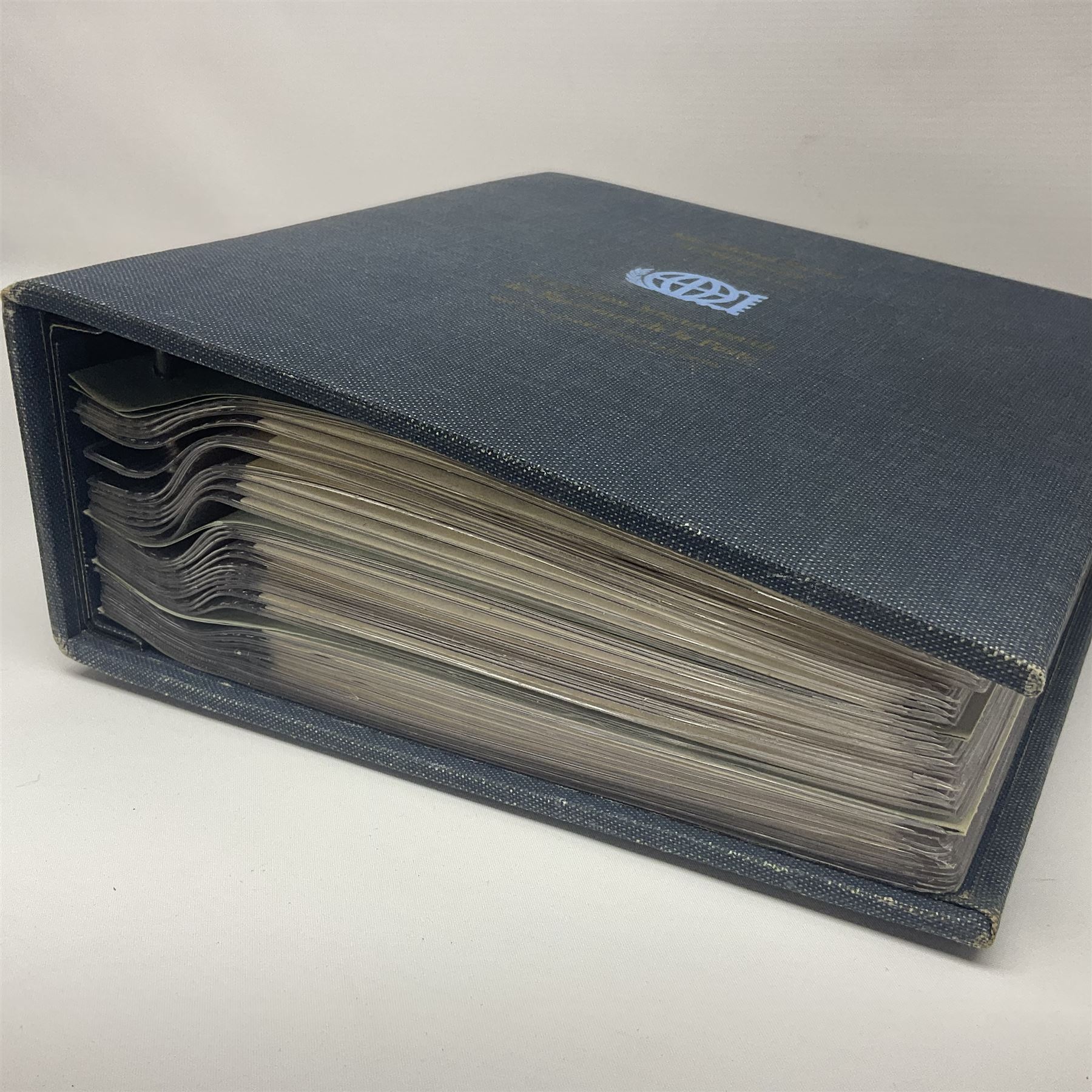 Thirty-one 'International Society of Postmasters Official Commemorative Issues' sterling silver proof medallic covers dating from 1975 to1977, housed in the official folder and a 'Commemorating The Bicentennial Of The United States Of America' sterling silver proof medallic first day cover in blue wallet