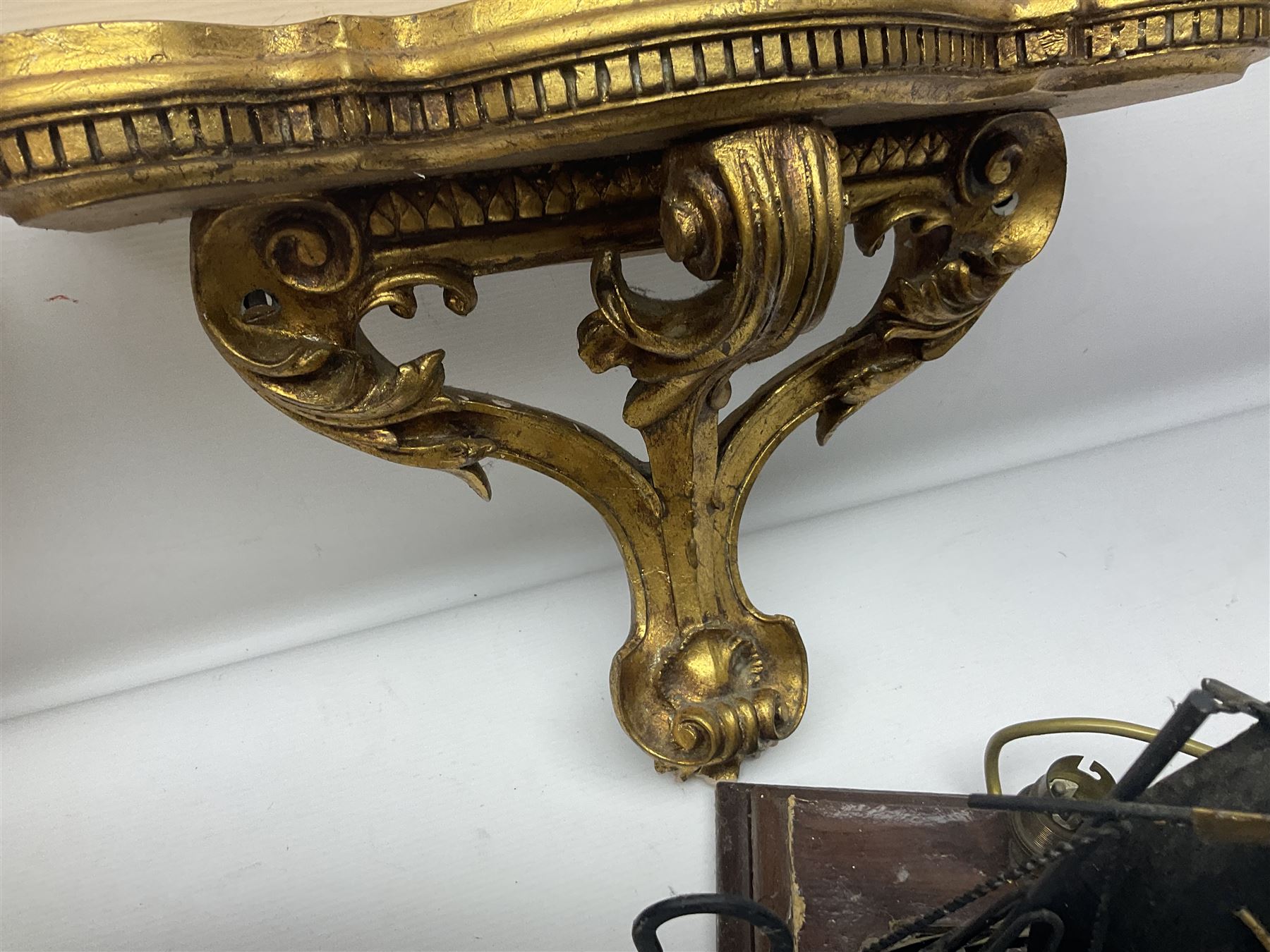Five various giltwood and other hall brackets, one with marble top; and Viking ship table lamp