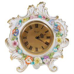 Collection of Coalport items, comprising floral mantel clock, houses including 'Park Lodge' 'The Umbrella House' 'Keepers Cottage', Coalbrookdale floral jar, and others; Kingmaker mouse ornament; Egyptian-style granite Bastet cat ornament, in one box