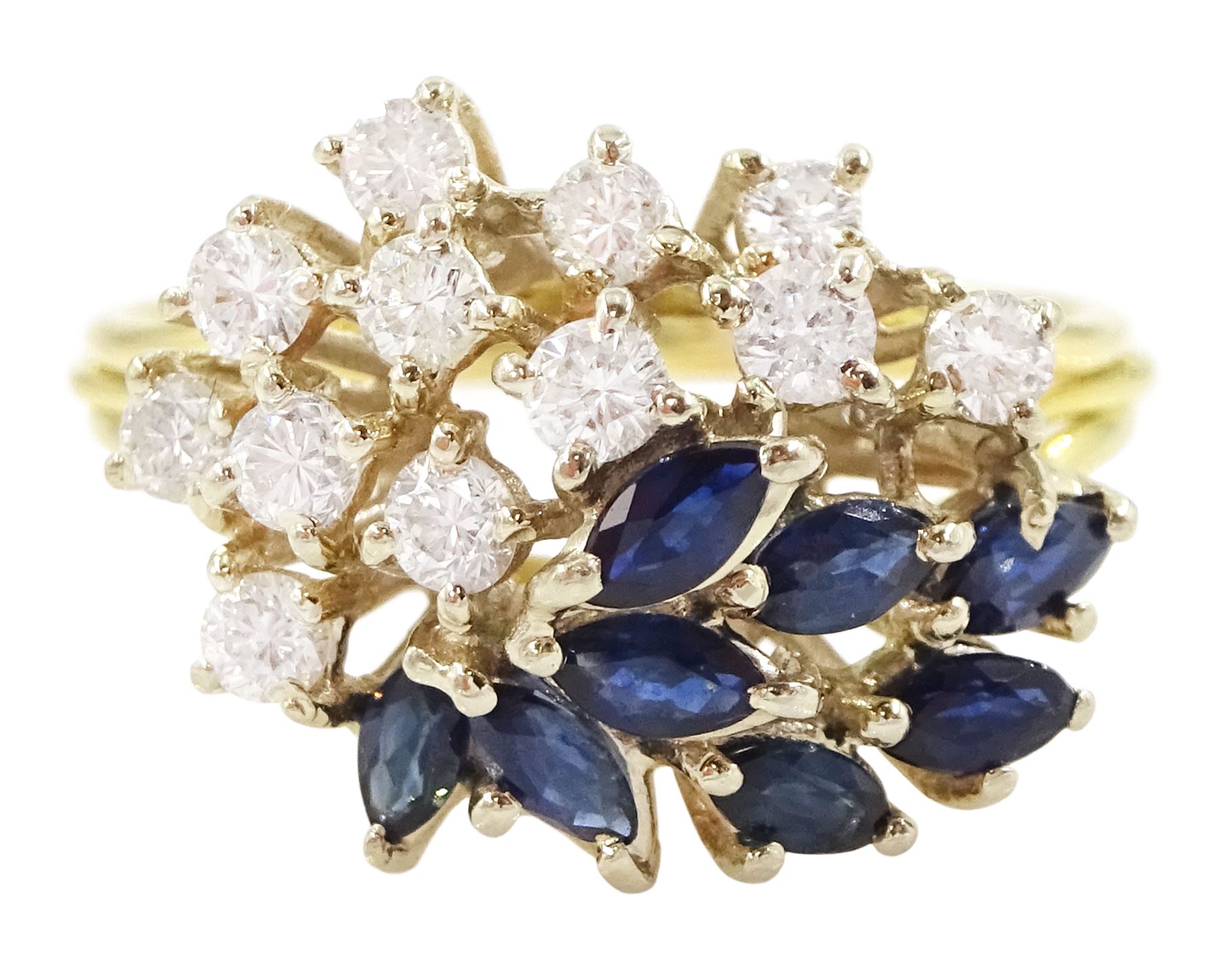 18ct gold sapphire and diamond cluster ring, twelve round brilliant cut diamonds and eight marquise cut sapphires, in a swirl design setting, Sheffield import mark 1989, total diamond weight approx 0.70 carat