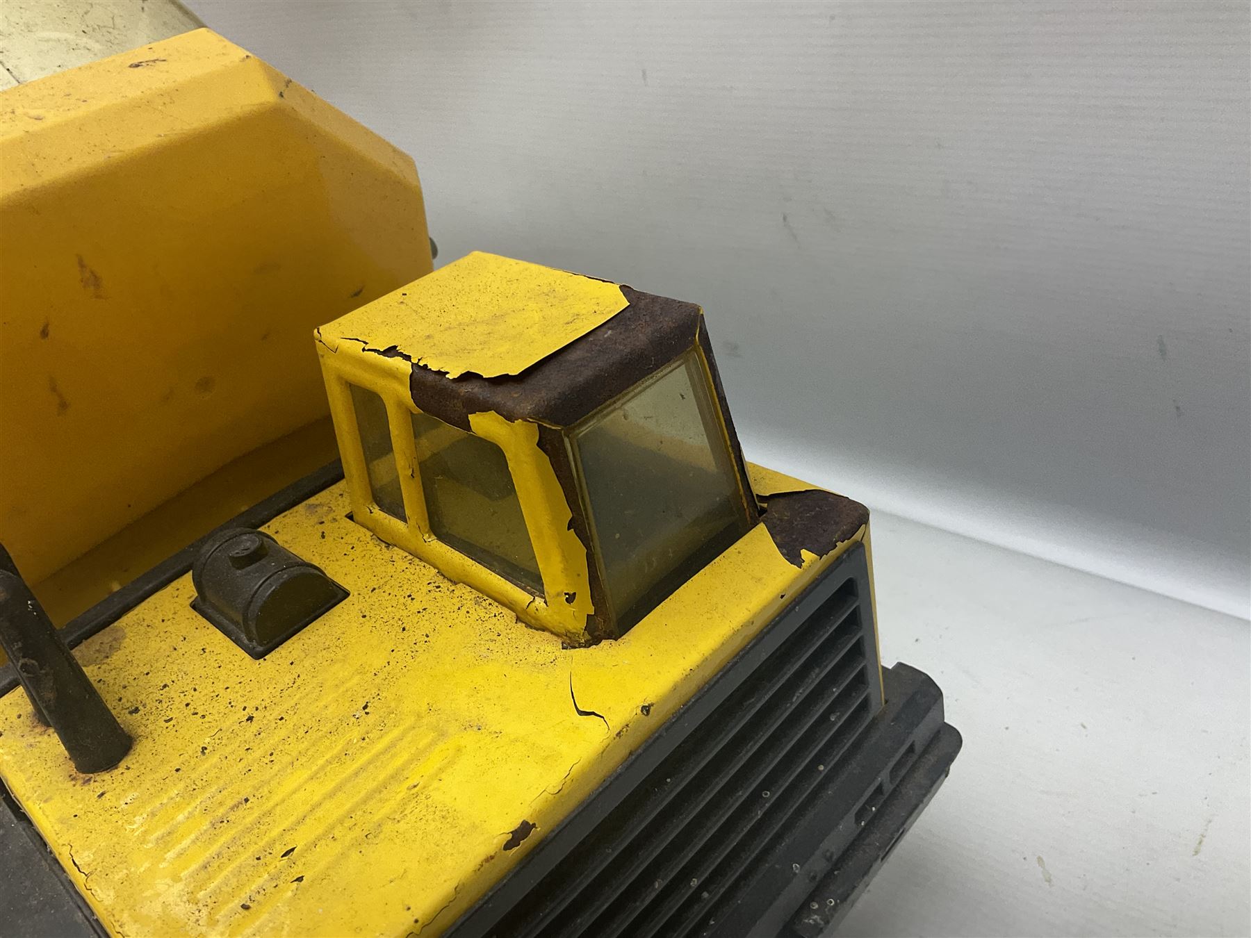 Tonka - five large scale pressed steel vehicles comprising Cement Mixer, Mobile Crane, Bulldozer and two Dumper Trucks (5)