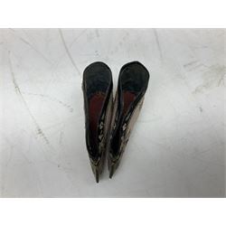 French silver plated wine taster of typical form, stamped, together with a silver plated napkin ring, and an 'Alpaca Silver' pill box with mother of pearl detailed cover, (3) together with Two pairs of late 19th/early 20th century Chinese Lotus shoes for binding feet, the first with purple silk heavily embroidered with ornate floral motifs, L10cm the second larger fuschia and black pair with thicker sole embroidered with flowers, L14cm