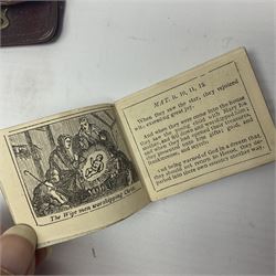 Miniature 1853 and 1855 Almanacks, one containing stamps; miniature Testament book; small leather stamp holder and Cartwheel penny
