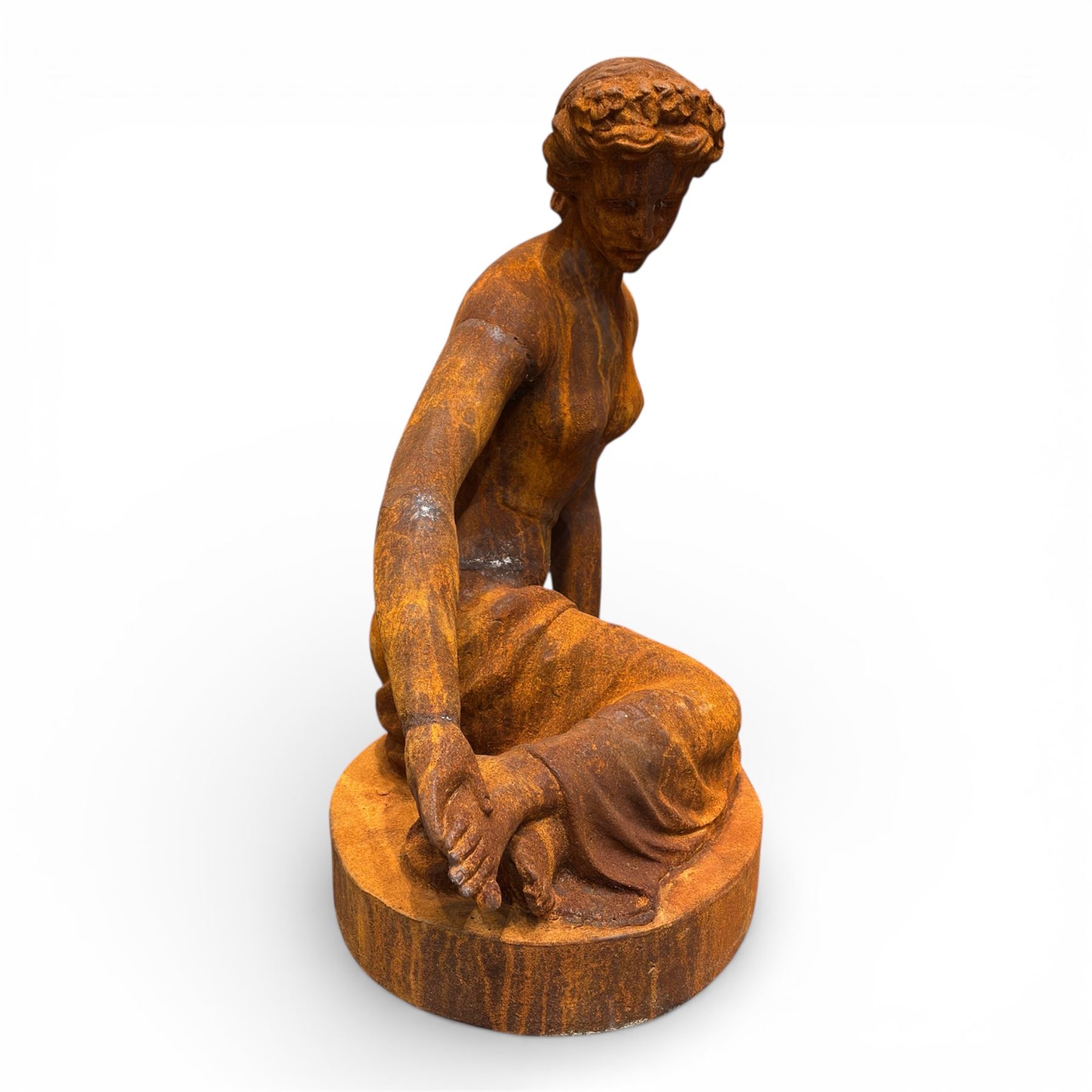 Victorian design cast iron semi-nude seated lady, on oval plinth base