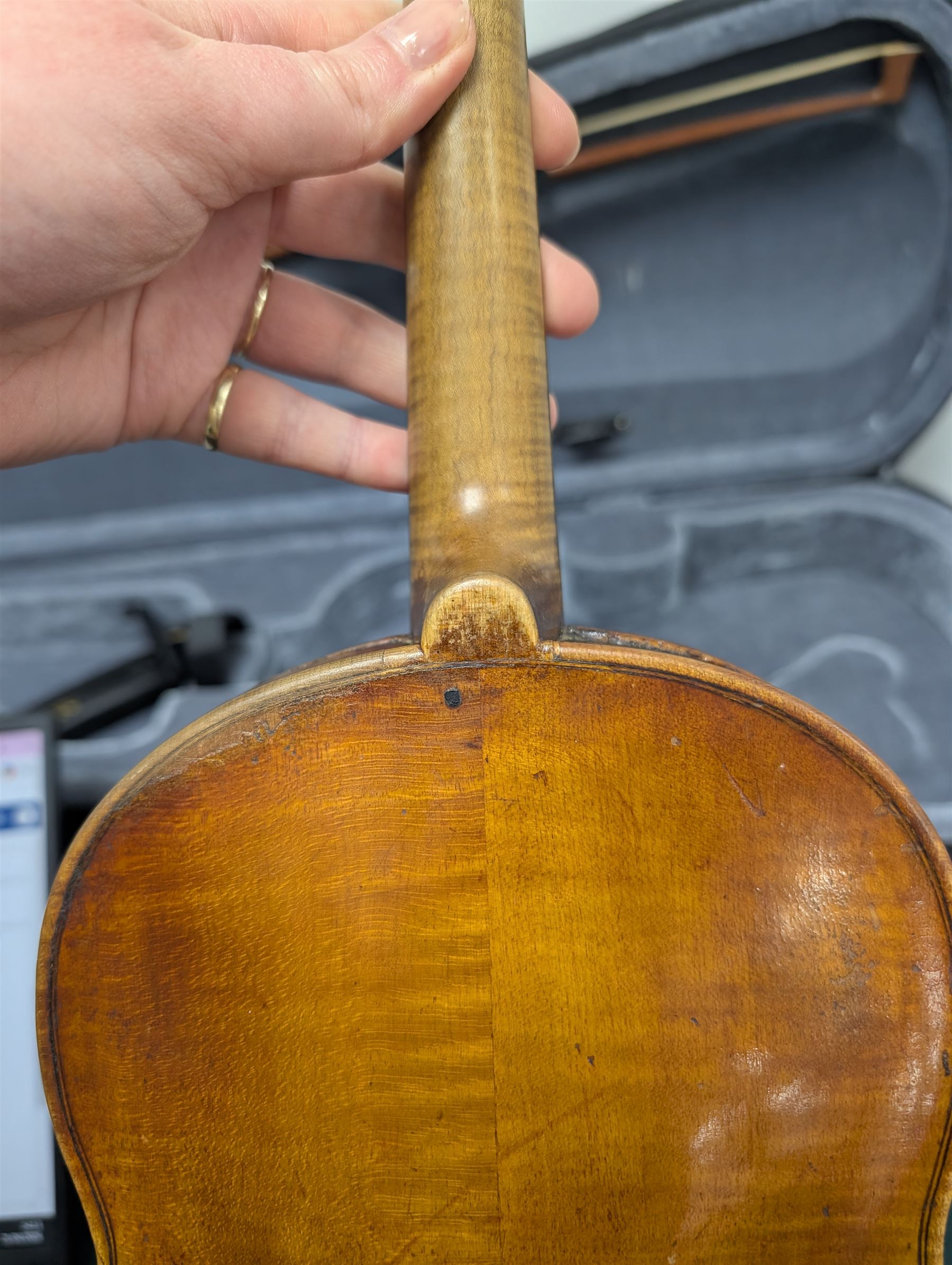 20th century violin, bearing label for Antonius and Hieronymus Amati, with bow stamped G. Werner, contained within fitted case