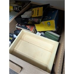 Collection of photography and photograph development accessories, including bulbs, development tanks, trays, projector lenses, etc