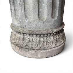 20th century good quality weathered cast stone pedestal urn of ecclesiastical design, circular lobed bowl with rope twist and lattice border, raised on squat base with fluted column  and acanthus decorated base