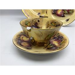 Aynsley Orchard gold pattern trio and vase, together with Edwardian Bone China plate, decorated with fruit, signed D. Wilson