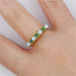 9ct gold seven stone emerald and opal ring, hallmarked