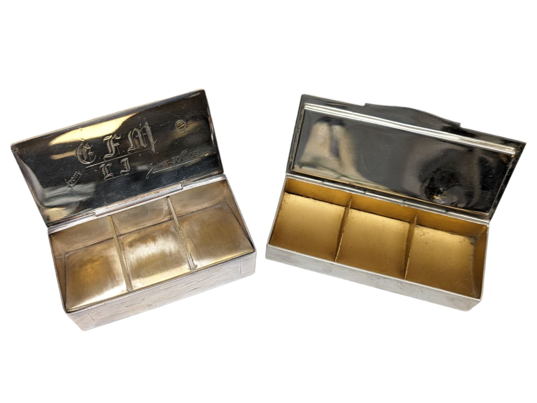 Two three division stamp boxes, the first with enamelled ladybird decoration and engraved initials to the inside of the hinged cover, the second with glass cover showing three King George V stamps