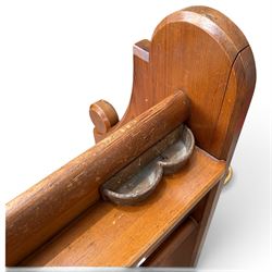 Early 20th century stained pine ecclesiastical church pew, the shaped end supports flanking slatted and panelled back, with black stencilled number '16' to the side