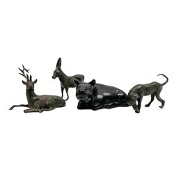 Japanese bronze okimono modelled as a recumbent cow, together with three further small bronze figures of animals comprising donkey, dog and deer, largest L12cm