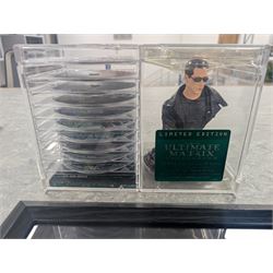 Signed The Matrix montage print with spurious signatures, together with framed Matrix prints and film cells and a limited edition ten DVD box set with bust
