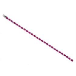  18ct white gold ruby and diamond bracelet, stamped 750, rubies approx 11.5 carat, diamonds approx 0.5 carat   