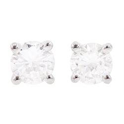 Pair of 18ct white gold round brilliant cut diamond stud earrings, stamped, total diamond weight approx 0.50 carat