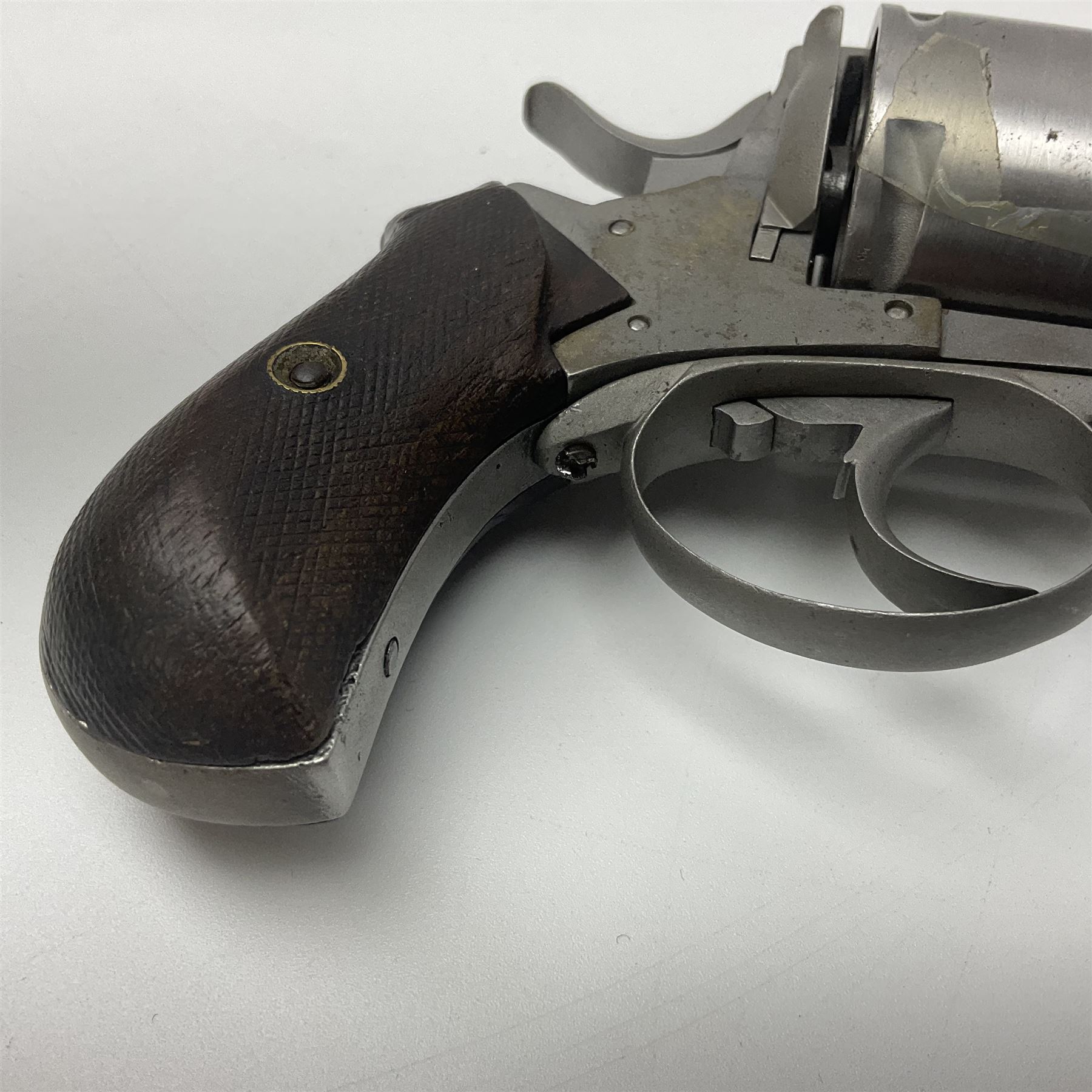 The major parts only of a British Bull-Dog .500 Boxer five-shot revolver comprising stripped down framework, cylinder, trigger with guard, functioning hammer and two-piece chequered grip; retailed by G. Goth Buenos Ayres; Belgian proof marks; L19.5cm overall; in fitted mahogany case 